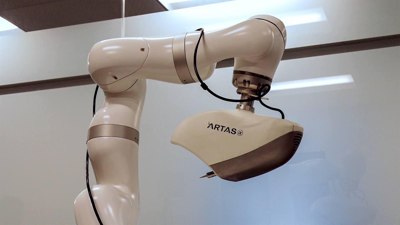 ARTAS Hair restoration robot with integrated LBR Med