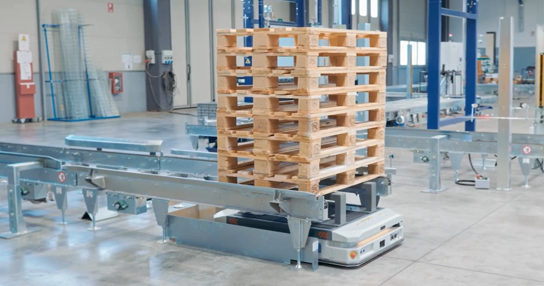 Pallet wrapping and AMR material flow