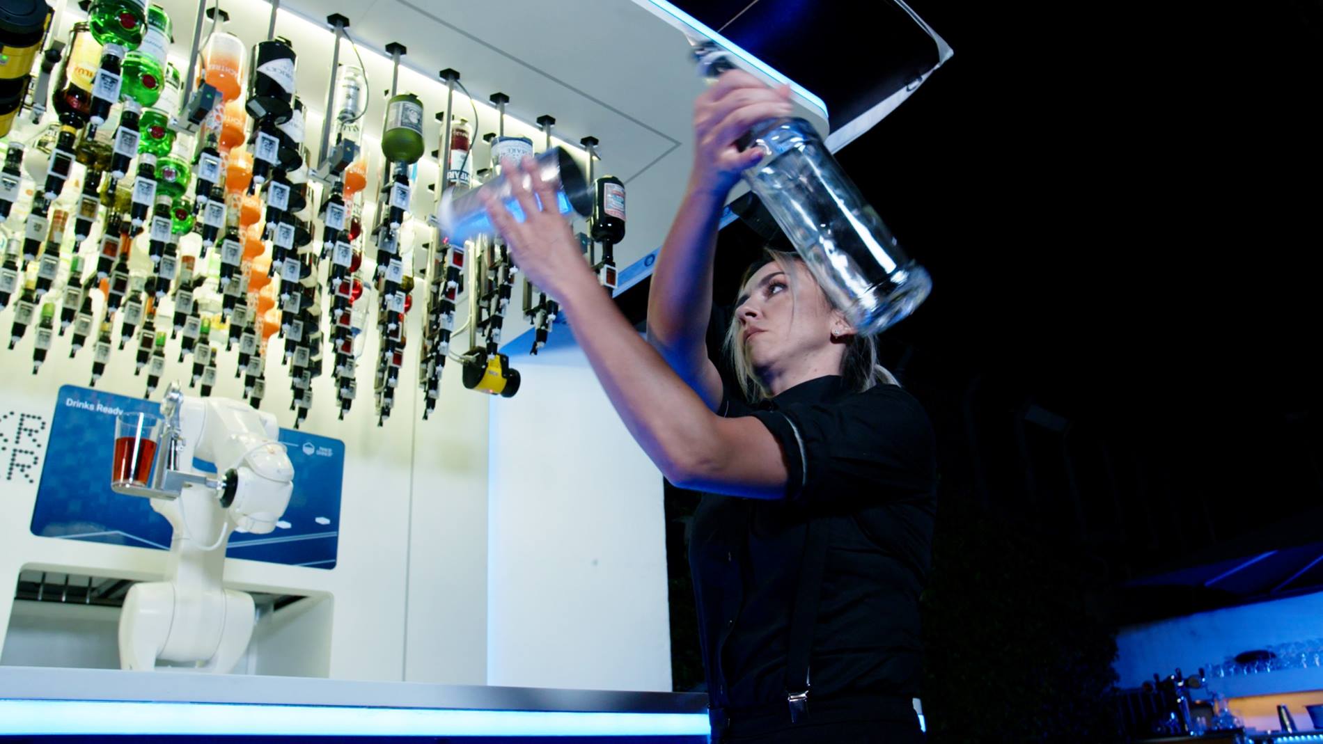 Silvia Daniela Istrate competing against the robotic bartender Toni
