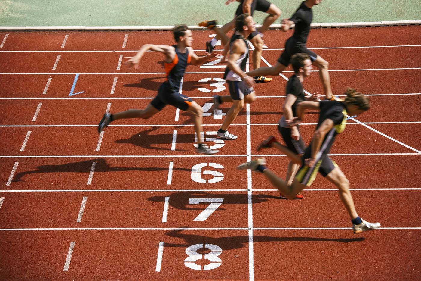 olympic sprinters on a tartan track