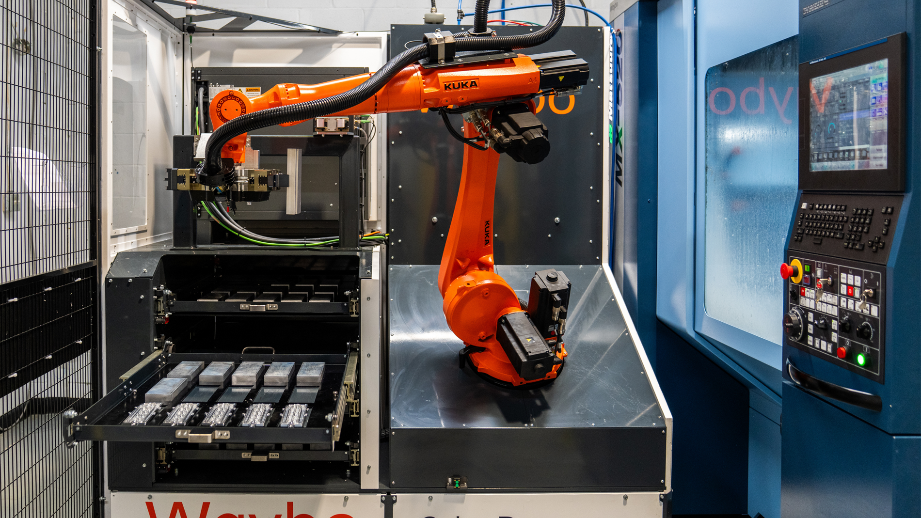 Machine tending robot cell