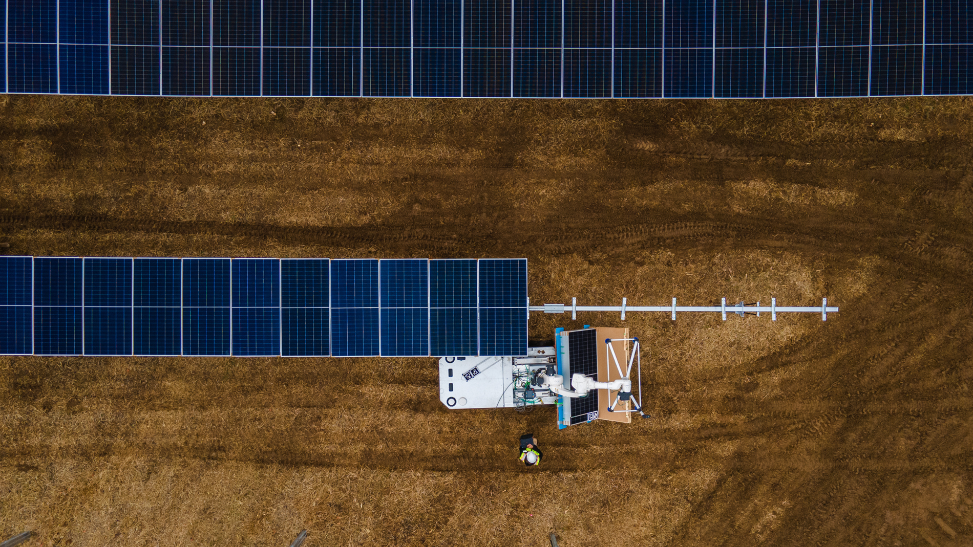A foundry-rated KUKA robot handles heavy solar panels outdoors, reducing manual lifting for installation crews.