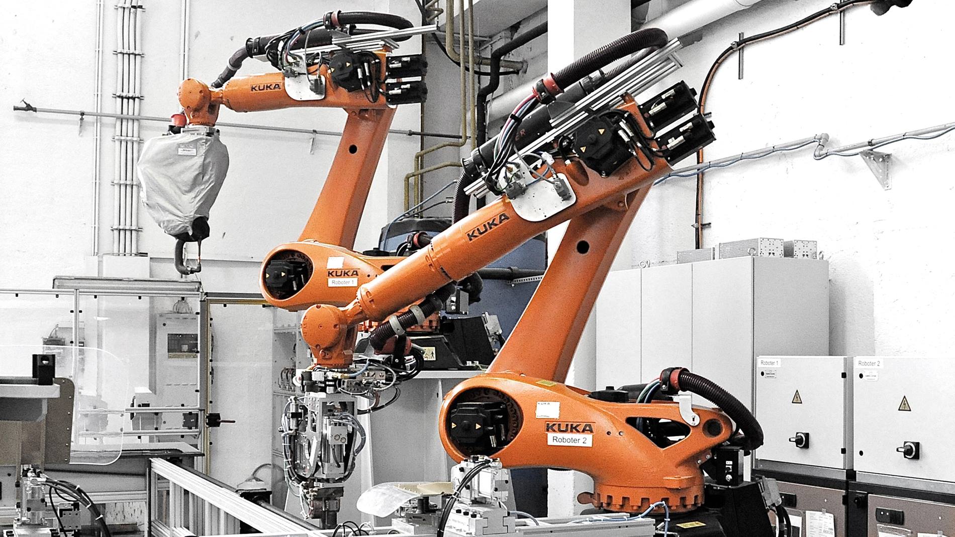 KUKA robots weld and mount door panels at Meiller Aufzugtüren
