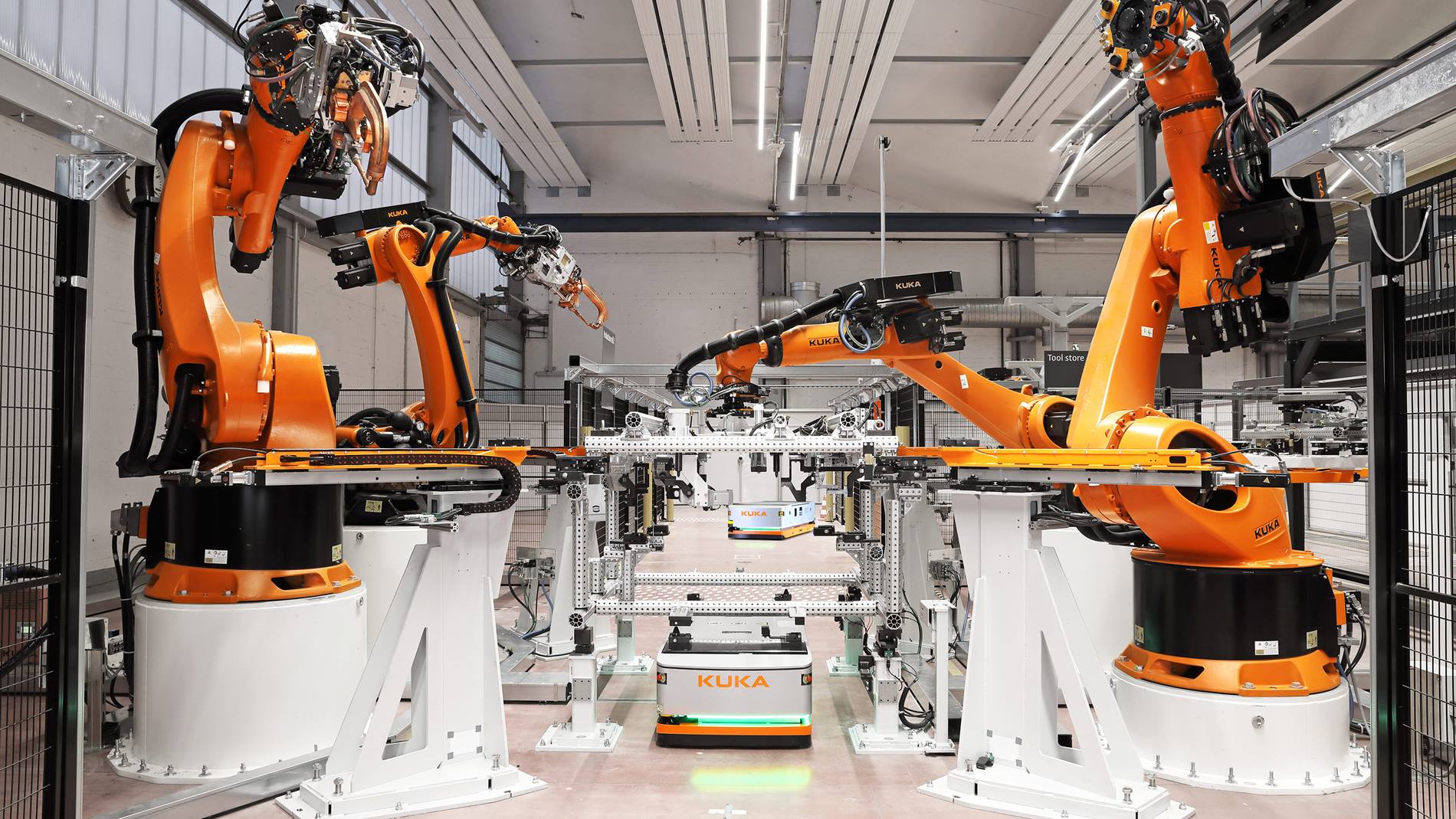 Industrial automation with robots and autonomous mobile robots (AMR) in a modern manufacturing environment