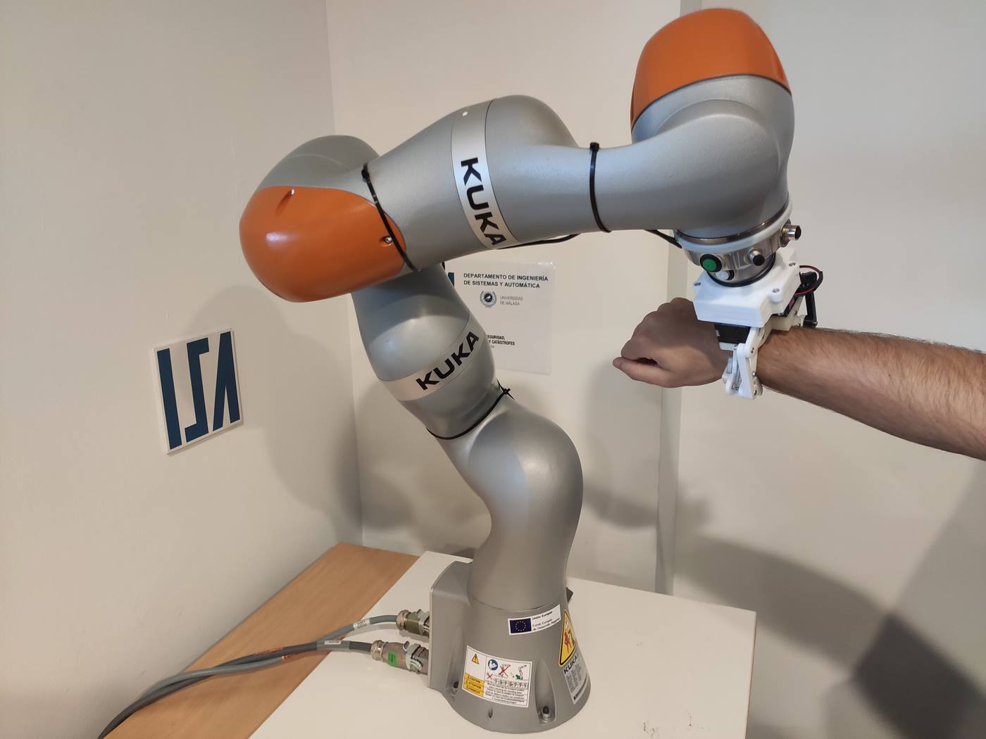 Robot grasping a hand