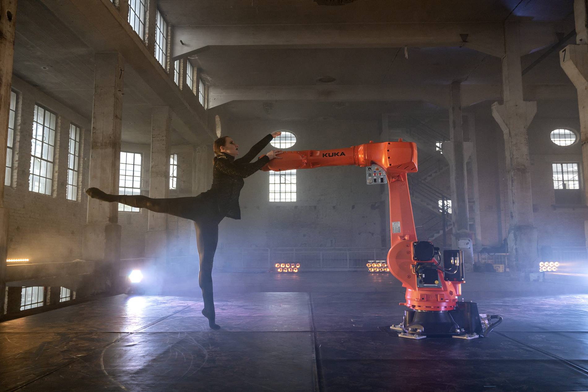 KUKA robot dances on stage at the Augsburg State Theater with a ballet dancer
